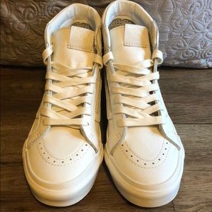 all white mid top vans